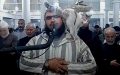 Curious Cat Climbs onto Imam’s Shoulders During Live Broadcast of Ramadan Prayer See!