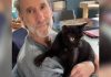 Man rescues tiny black cat from field not knowing he’d quickly return the favor